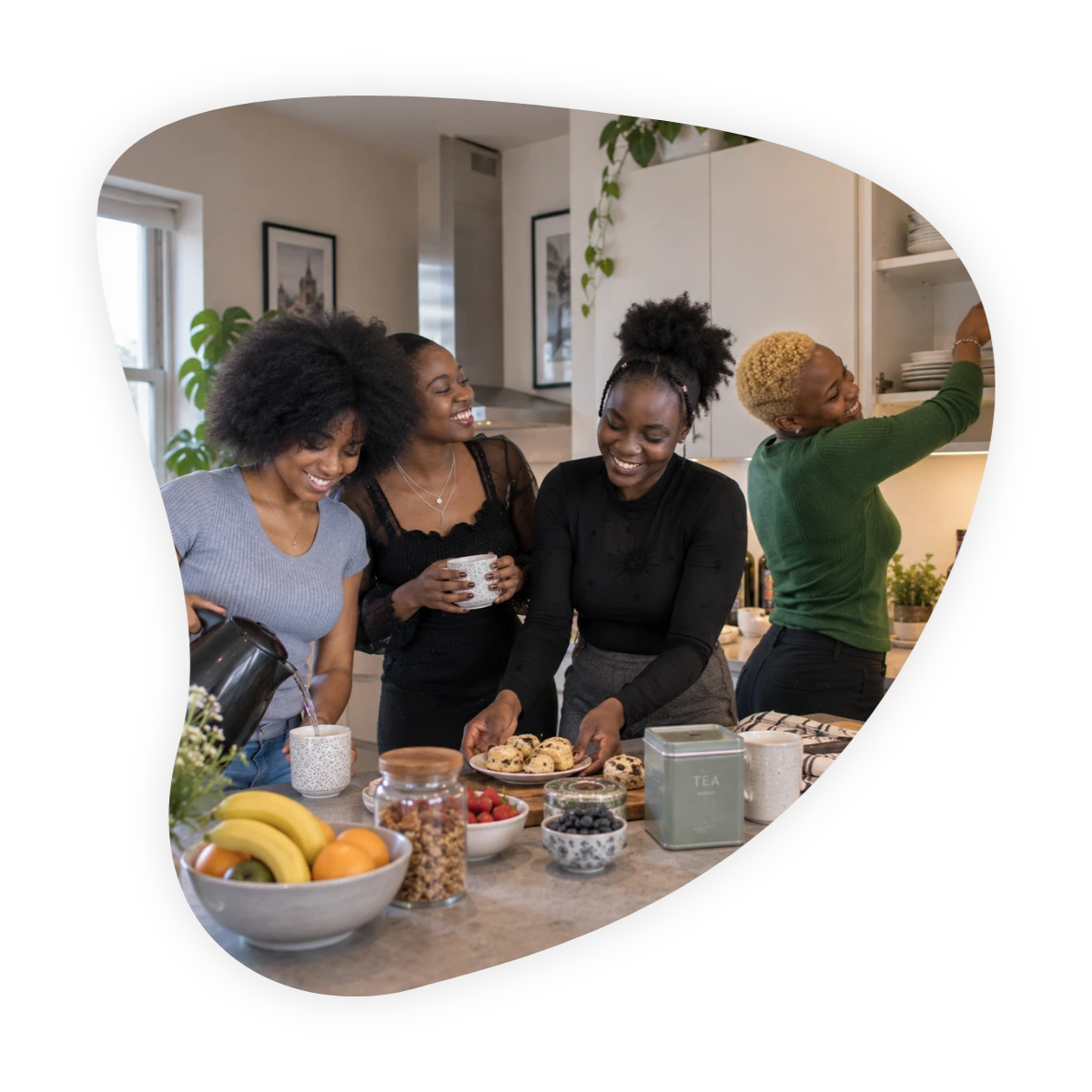 How long does it take to become best friends: four women spending relaxed time together in a kitchen